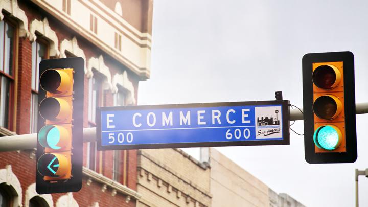 Ecommerce street sign next to stop light