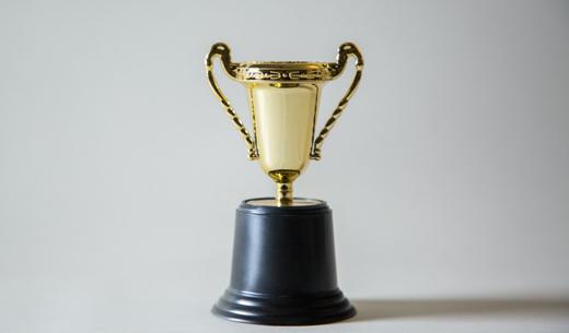 yellow and white trophy