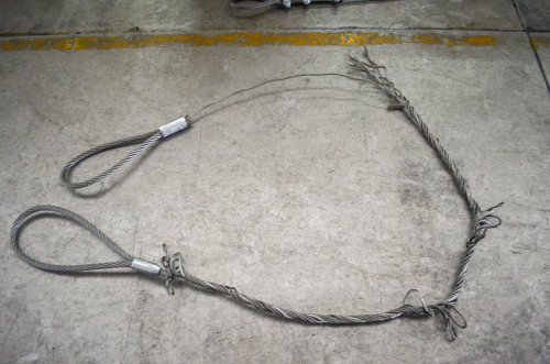 damaged wire rope on factory floor