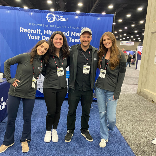 Dara, Shelby, Garret & Catie at a conference - Team Engine Culture