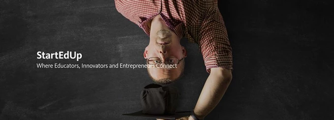 Person laying upside down looking at camera