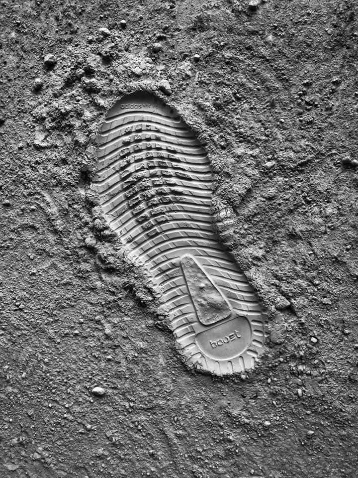 grayscale photo of sneaker sole print