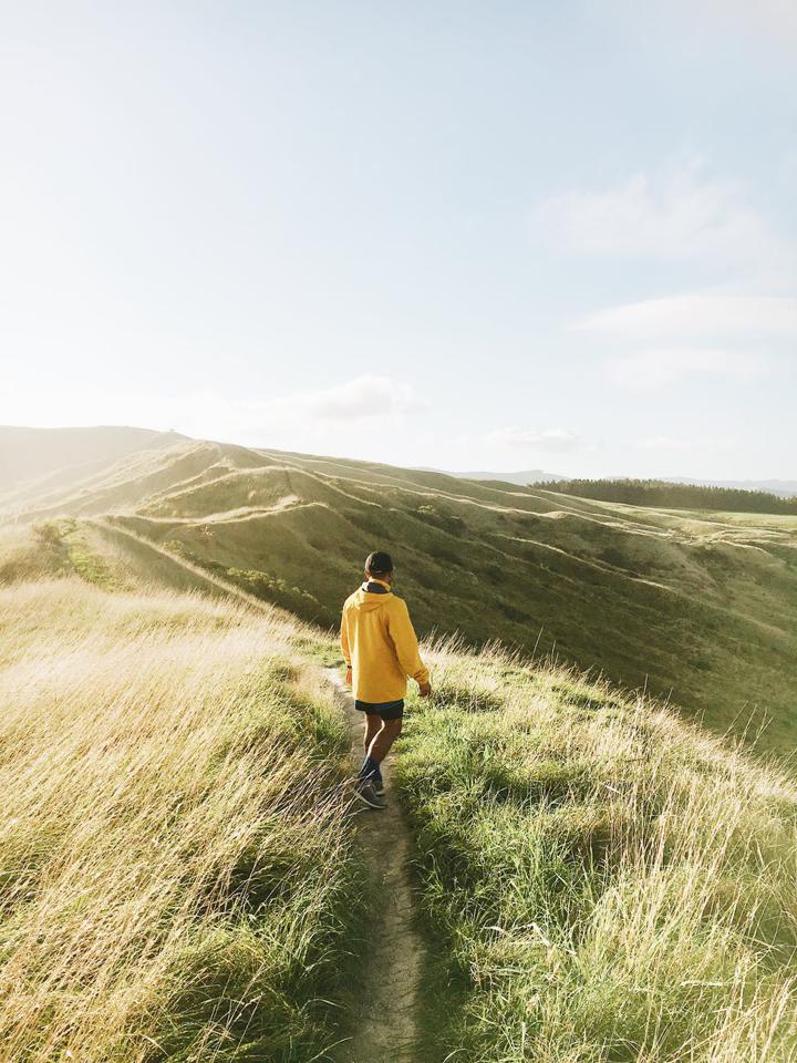 man standing on mountain